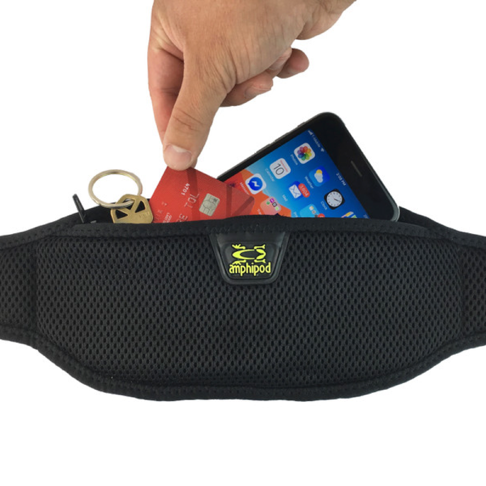 Detail view of Amphipod Smart View Waistpack with example items inside.