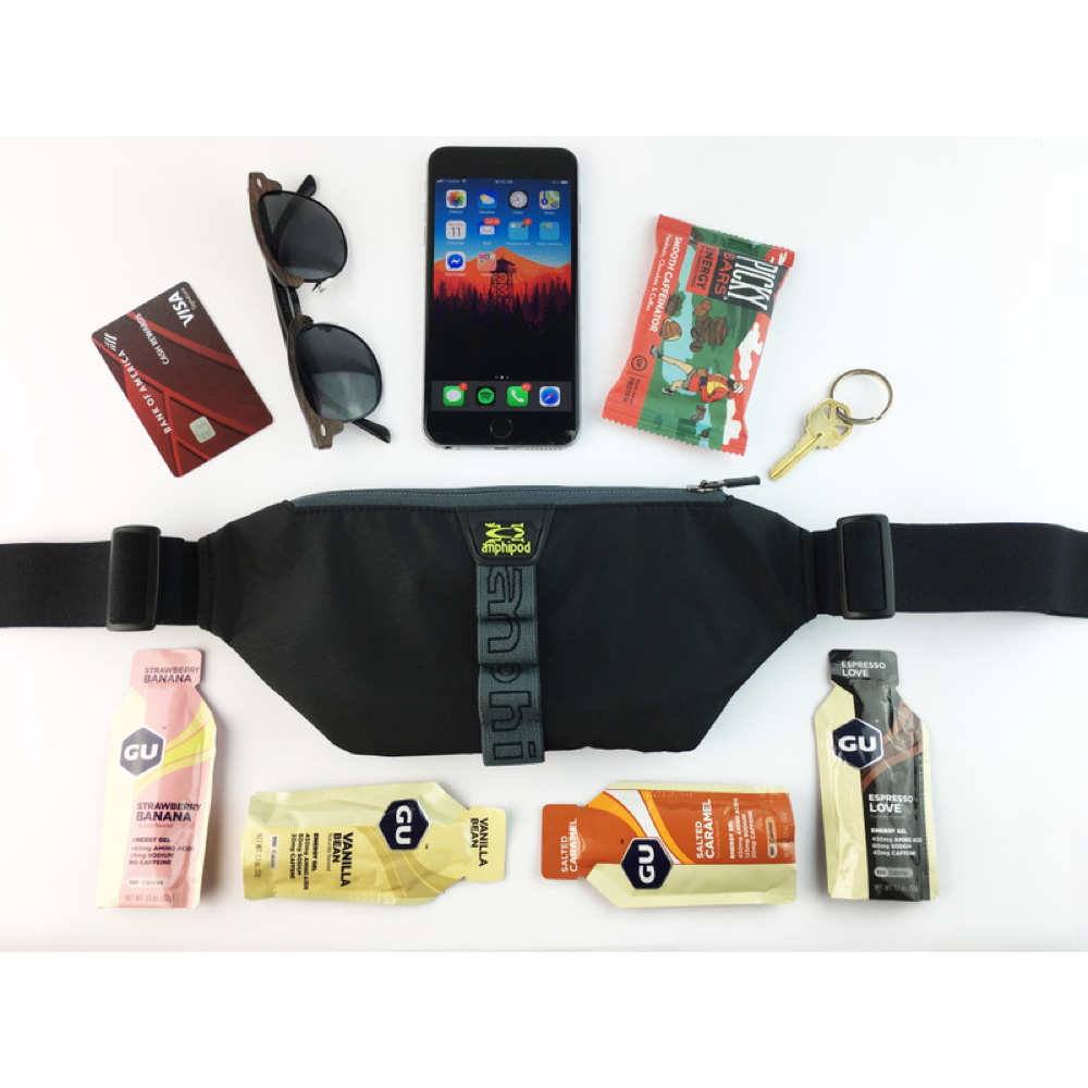 Flat Lay view of Amphipod Arm Pod Smart View Sumo with example items to store inside.