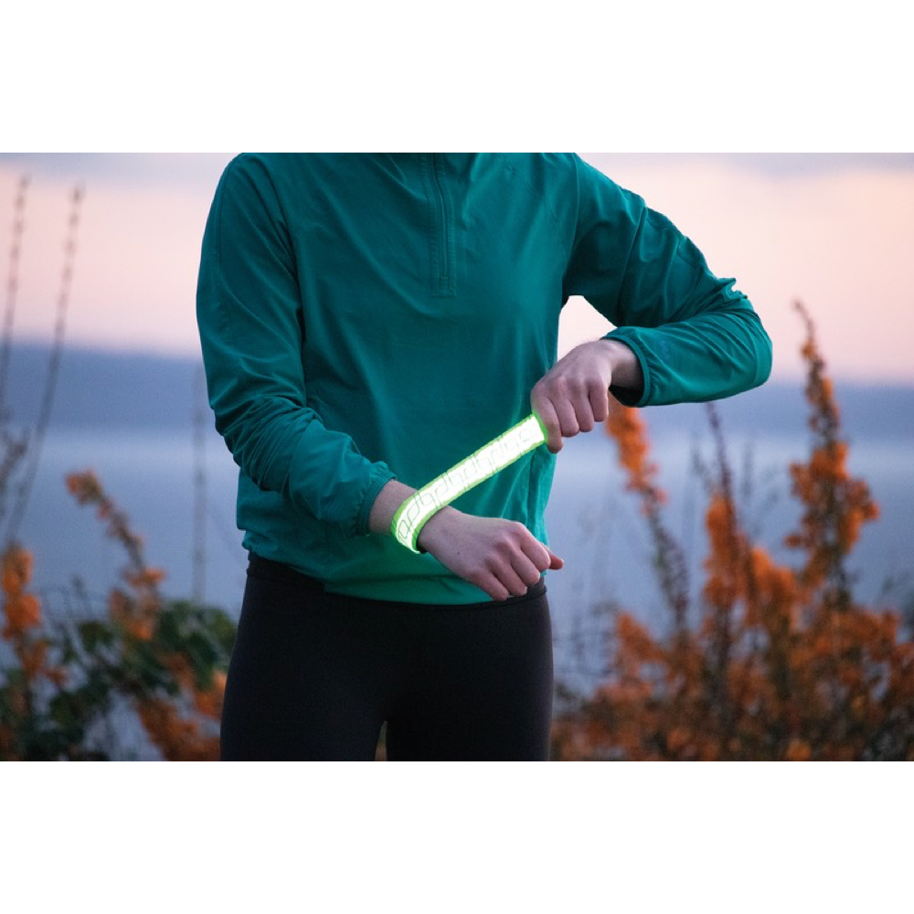 Model view of Amphipod Full Viz Rechargeable Flashing Reflective Slap Band.