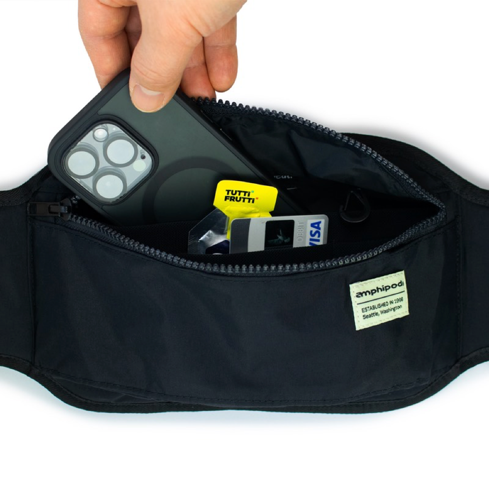 Detail view of Amphipod R3 Venture Out Convertible Pack with example items to store inside.