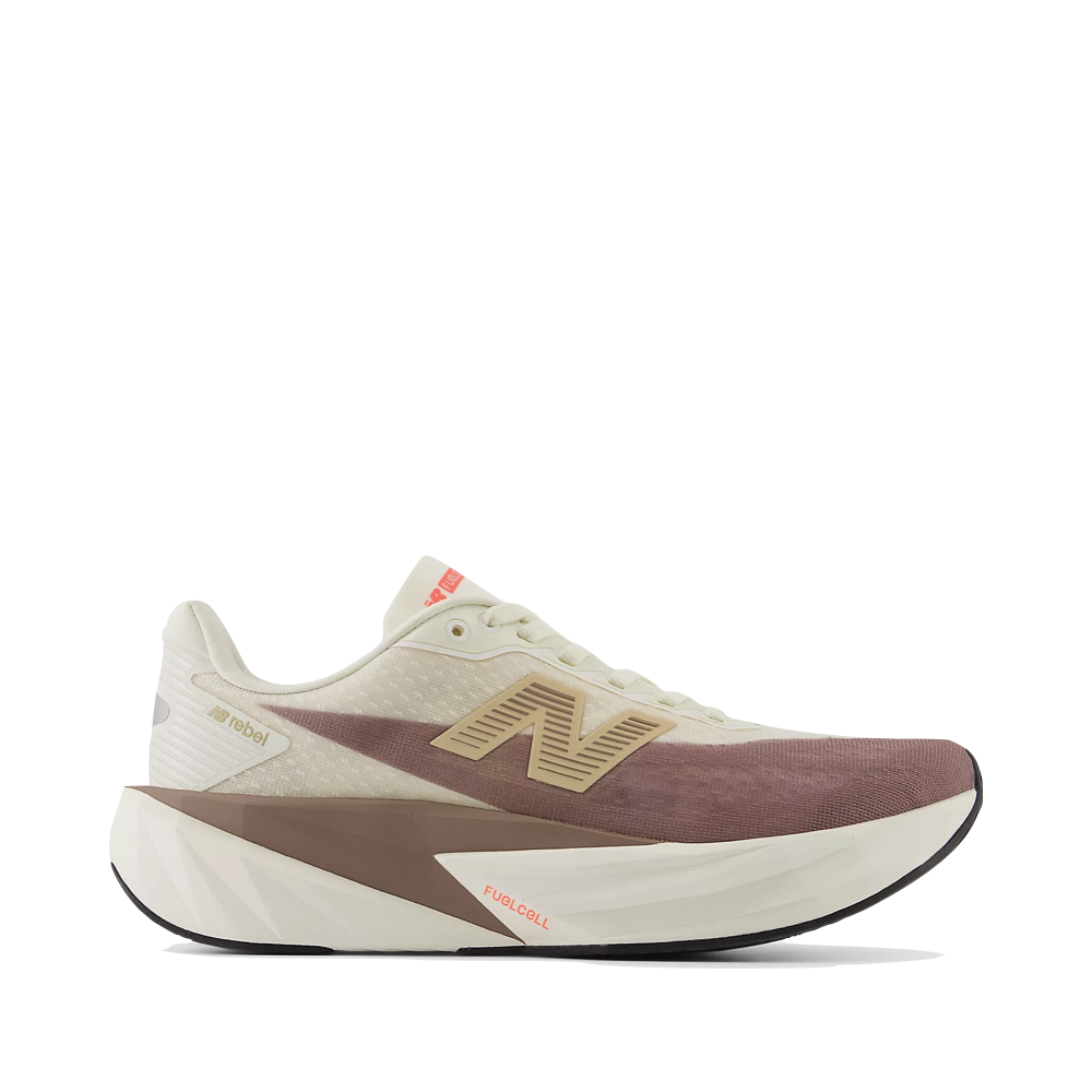Side (left) view of New Balance Fuel Cell Rebel v5 Sneaker for women.