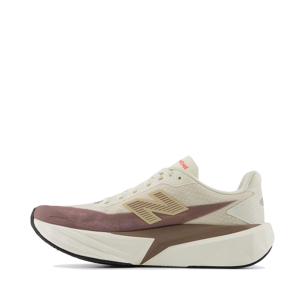 Side (left) view of New Balance Fuel Cell Rebel v5 Sneaker for women.