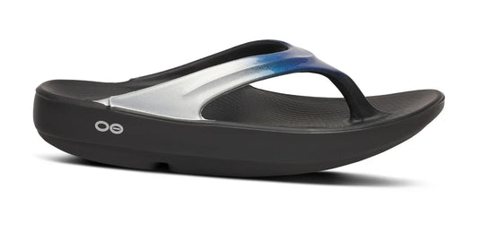 OOfos Women's OOlala Luxe Thong Flip Sandal in Shimmer Blue