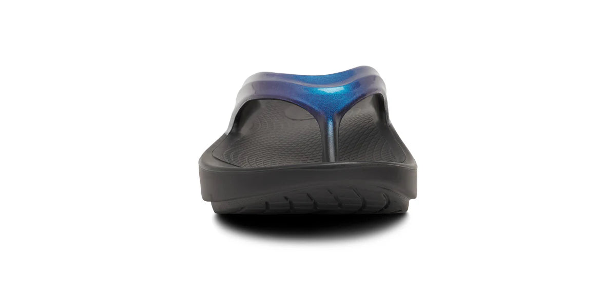 OOfos Women's OOlala Luxe Thong Flip Sandal in Shimmer Blue