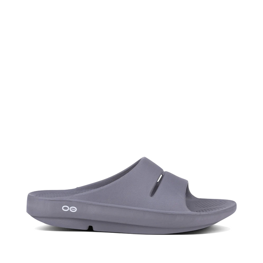 Side (right) view of OOfos OOahh Slide Sandal for unisex.