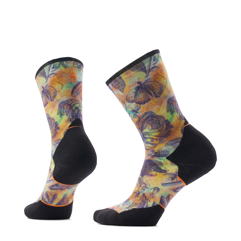 Side (left) and bottom view of Smartwool Trail Run Targeted Cushion Floral Party Print Crew socks for women.